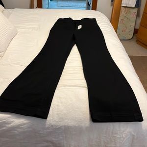 Black high waisted jeans.